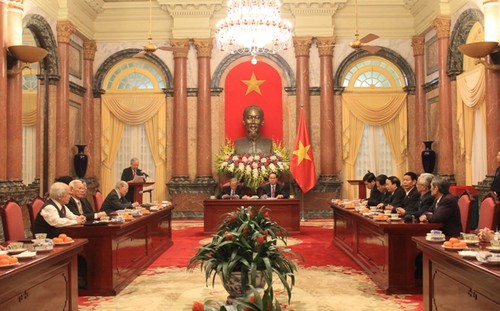 Chủ tịch nước Trần Đại Quang tiếp Ban liên lạc cựu chuyên gia Việt Nam giúp cách mạng Campuchia - ảnh 1
